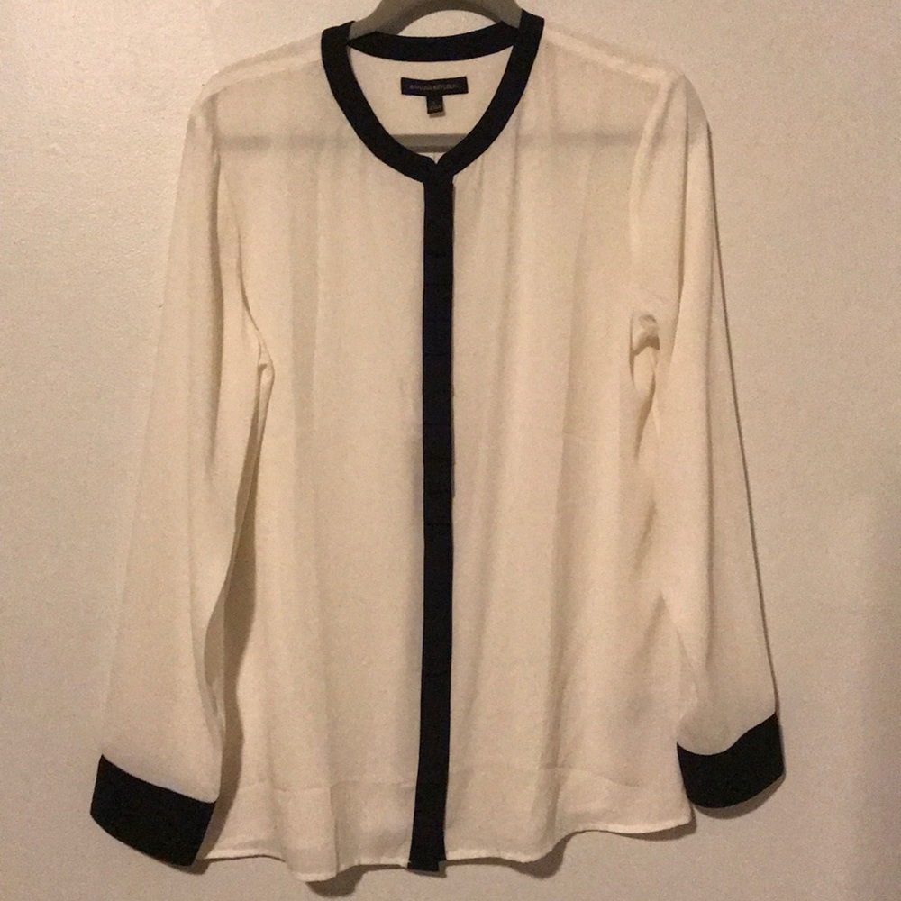 NWOT- Stunning cream and black blouse; size large.